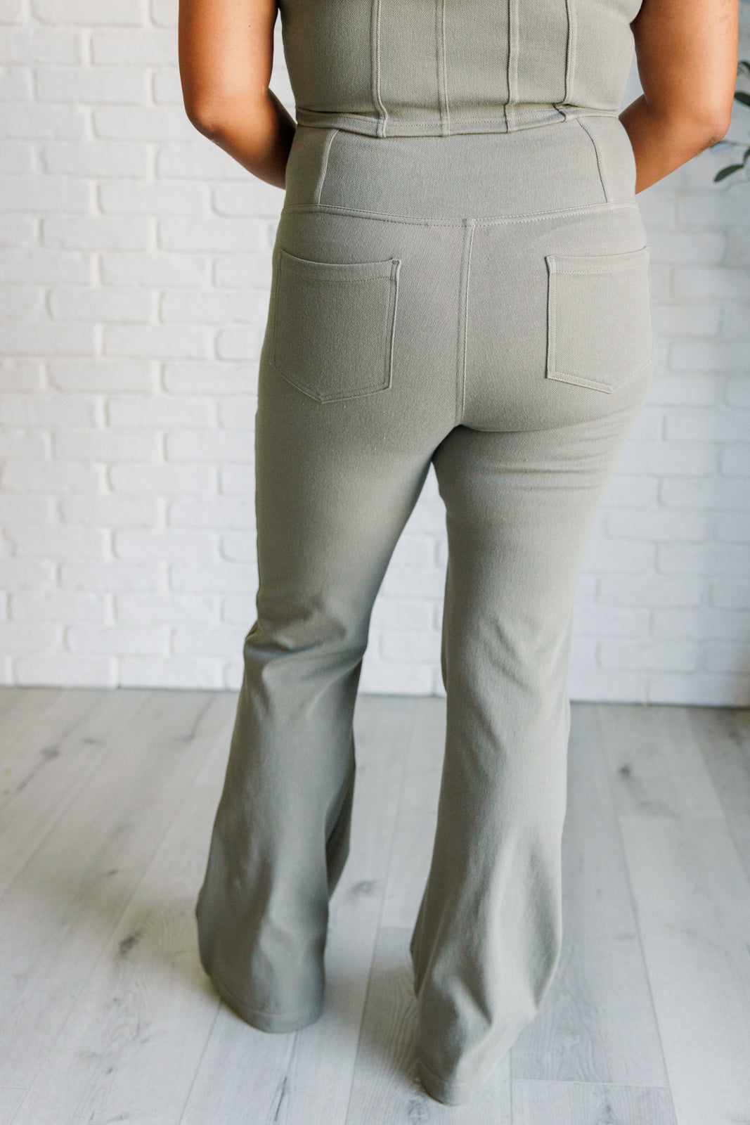 Building Habits Twill Flared Crossover Waist Pant in Dusty Olive - Rae Mode