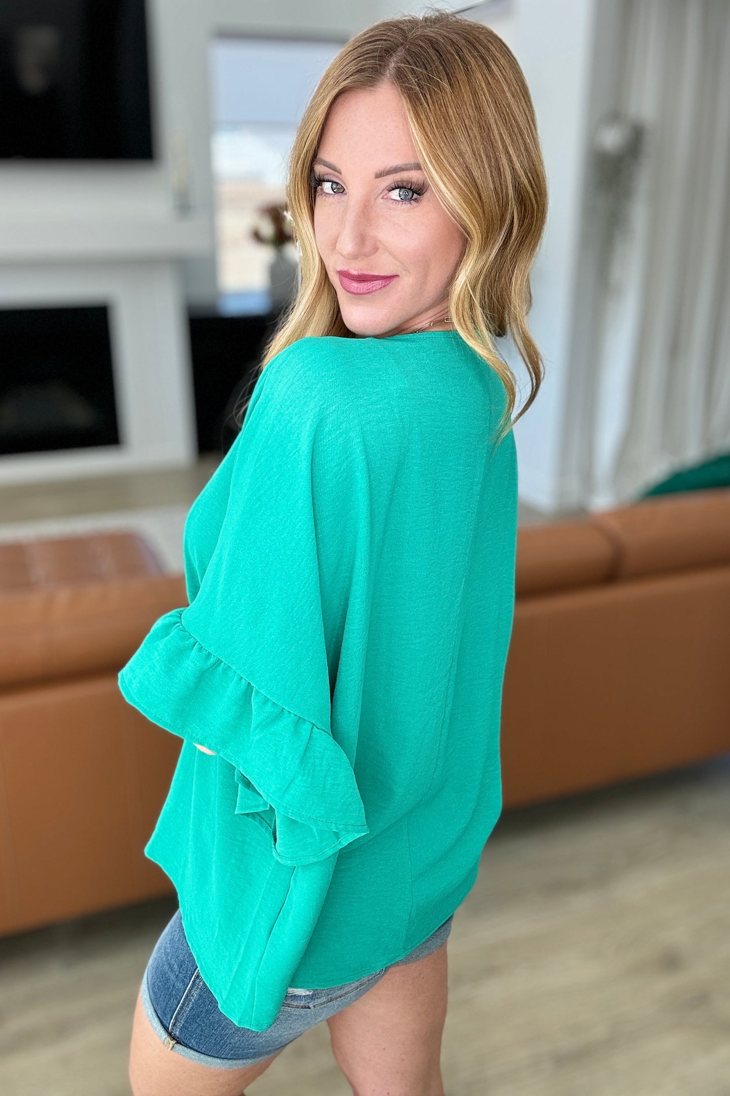 Airflow Peplum Ruffle Sleeve Top in Emerald - Andree By Unit