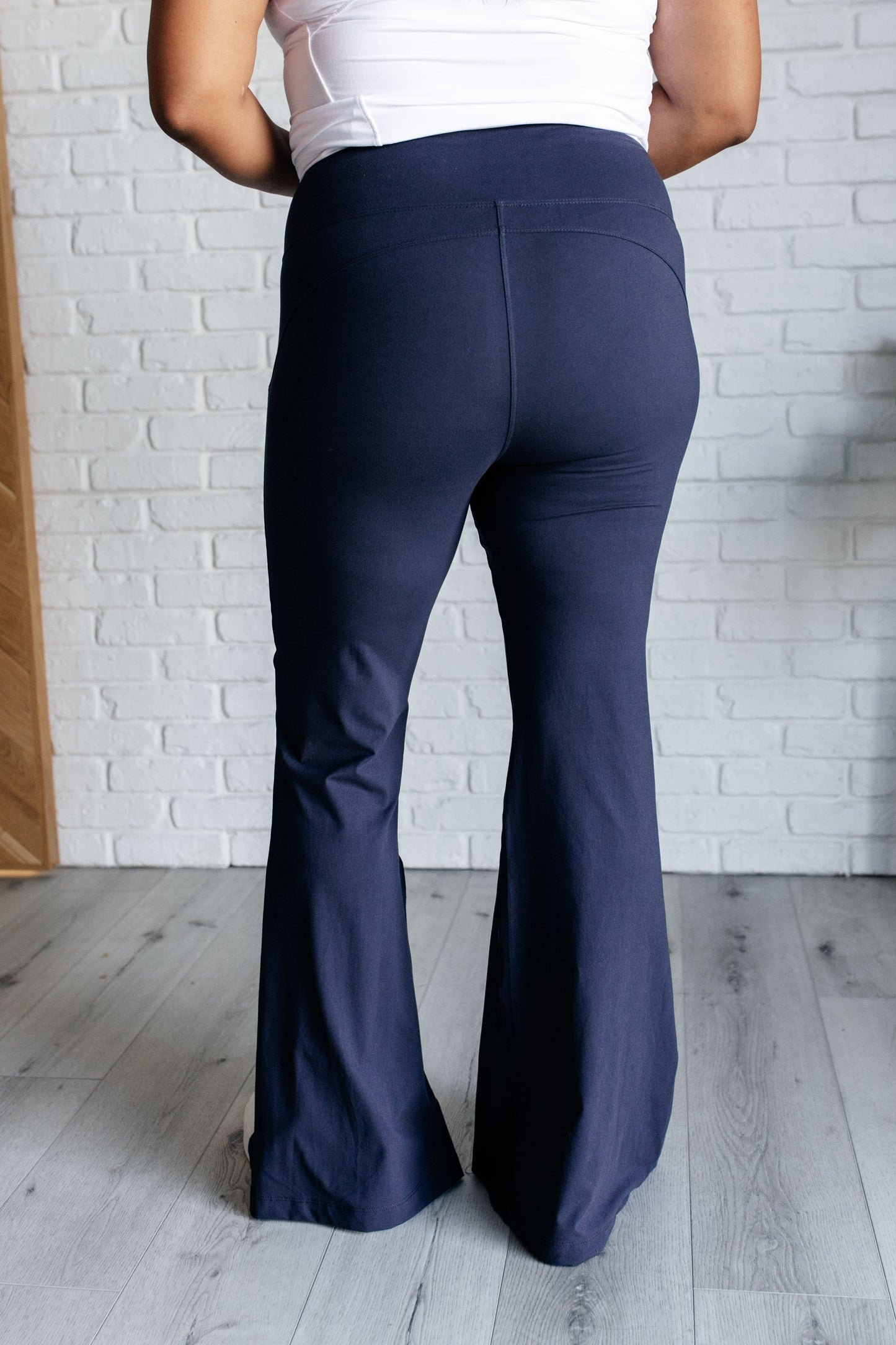 Stamina Stride Flare Leggings in Navy - Rae Mode