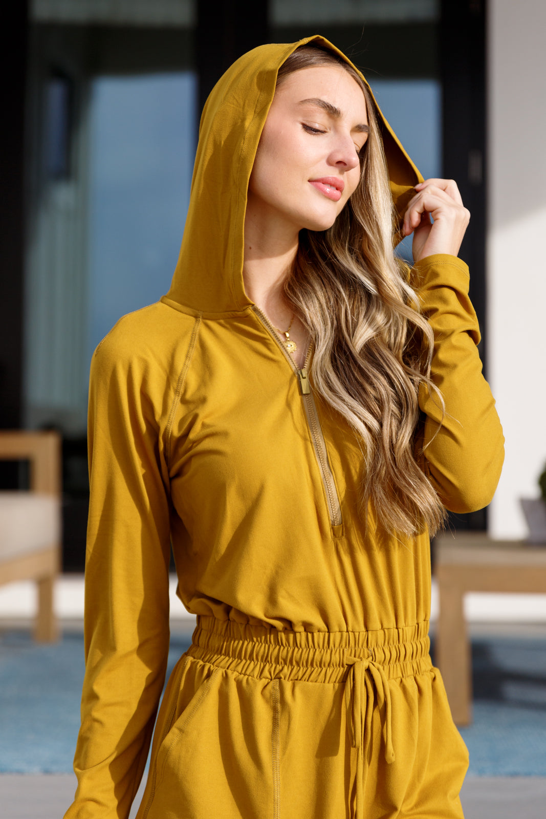 Getting Out Long Sleeve Hoodie Romper Gold Spice - Rae Mode
